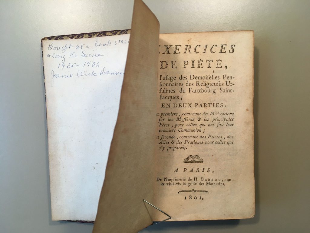 Old book showing inscription on inside cover
