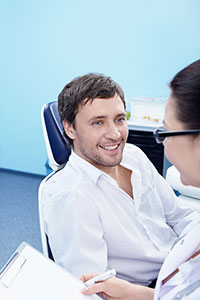 young male patient in chair
